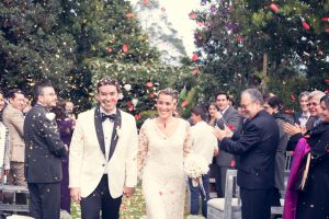 the-couple-being-paraded-with-flowers-rustic-perfection