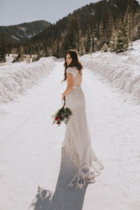 alice-backless-embroidered-simple-lace-wedding-dress-with-cut-out-open-back-photographed-in-the-snow