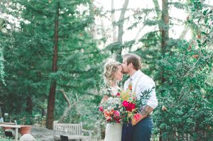 couple-photos-with-large-oversized-wedding-flowers- colorful
