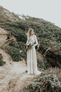 boho-bride-nelli-wearing-lisa-long-sleeve-wedding-dress-photographed-by-the-california-coast