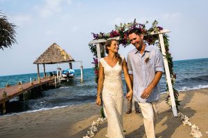 bride-in-Belize-wearing-a-simple-lace-wedding-dress-for-her-beach-wedding