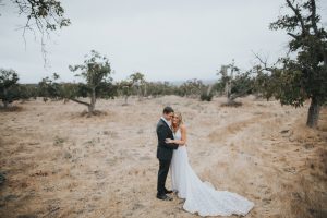 a-bohemian-bride-and-her-groom-in-the-California-fields-moody-bohemian-inspiration