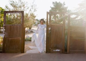 bohemian-wedding-inspiration-at-rimrock-ranch-in-palm-springs-featuring-a-long-sleeve-crochet-lace-wedding-gown