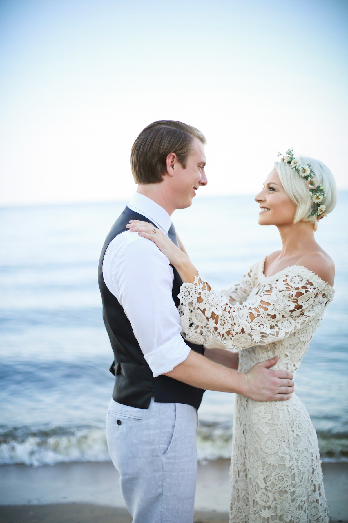 heidi-and-kyle-shares-a-tender-moment-at-their-simple-boho-beach-wedding