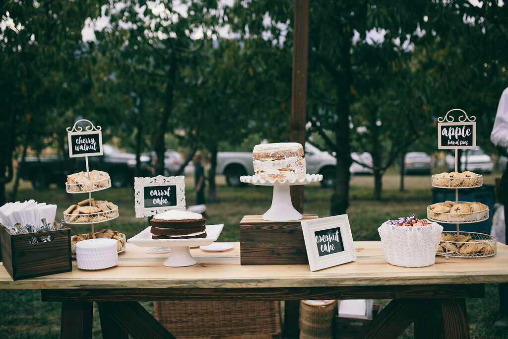 the-dessert-table-filled-with-homemade-cakes-and-pies-for-Dan-and-Lizzy-bohemian-wedding