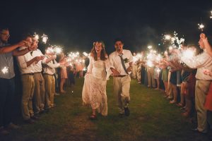 couple-exit-to-sparklers-bohemian-wedding-inspiration-set-in-Oklahoma
