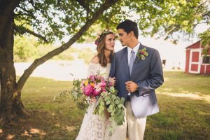 bride-wears-sydnie-lace-off-shoulder-boho-wedding-dress-to-marry-her-grrom-at-their-oklahoma-venue