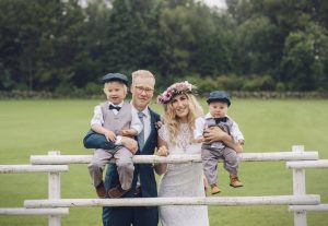 a-bohemian-bride-nd-her-hipster-groom-with-their-two-children-on-wedding-day