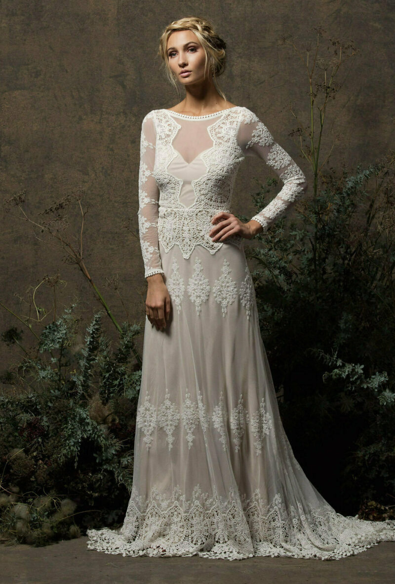 dreamers-and-lovers-bohemian-wedding-dress-the-aurora-gown-with-long-sleeves-open-back-and-crochet-trim