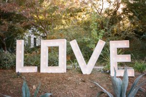 a-lighted-giant-love-sign-from-this-california-rustic-wedding
