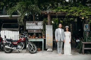 the-barefoot-couple-in-tulum-mexico-she-wears-a-romantic-long-sleeve-lace-dress