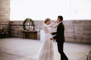 that-moment-right-after-the-first-look-the-groom-and-his-bride-wearing-the-long-sleeves-backless-lisa-lace-boho-wedding-dress
