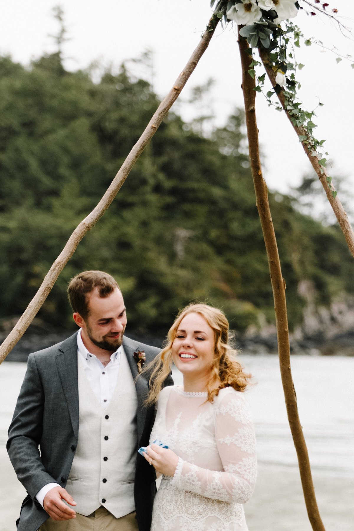 an-intimate-wedding-with-just-8-guests-in-a-dreamy-setting-bride-wearing-long-simple-wedding-dress-with-crochet-adornments