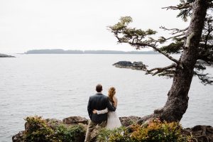 the-bride-and-groom-at-their-smal-intimate-canada-wedding-overlooking-a-lake