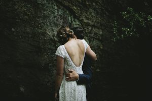 dreamers-and-lovers-bride-wearing-the-catherine-backless-lace-dress-for-her-intimate-hiltop-elopement