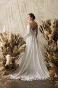 gabrielle-low-back-long-sleeve-lace-wedding-dress-bohemian-fringe-hem-long-sleeves