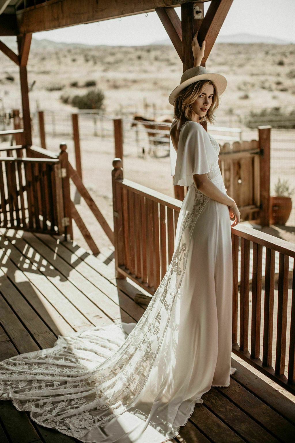 Hayley Wedding Dress Hayley-lace-and-crepe-romantic-wedding-dress-with-cape-sleeves-dreamy-train-and-low-cut-neckline