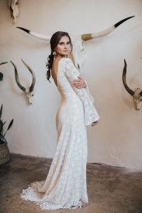 Marie-bohemian-lace-wedding-dress-long-bell-sleeves-v-neck-fringe-hem