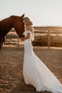 Poppy-off-the-shoulder-crepe-simple-bohemian-wedding-dress-for-the-bride-who-likes-just-a-touch-of-lace