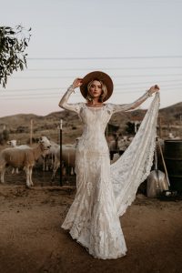 Willow-bohemian-lace-wedding-dress-with-long-sleeves-and-cut-out-open-back-cutout-open-back-and-long-train