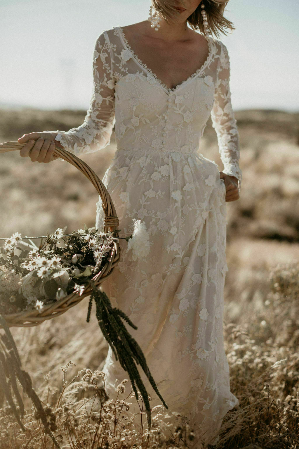 close-up-of-the-new-zinnia-romantic-bohemian-wedding-dress-with-long-sleeves-and-open-back