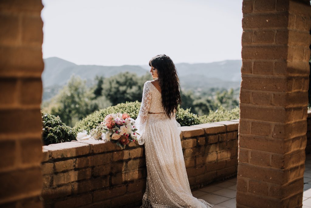 Bride-Amanda-at-the-Condor's-Nest-Ranch-wearing-2-piece-wedding-dress