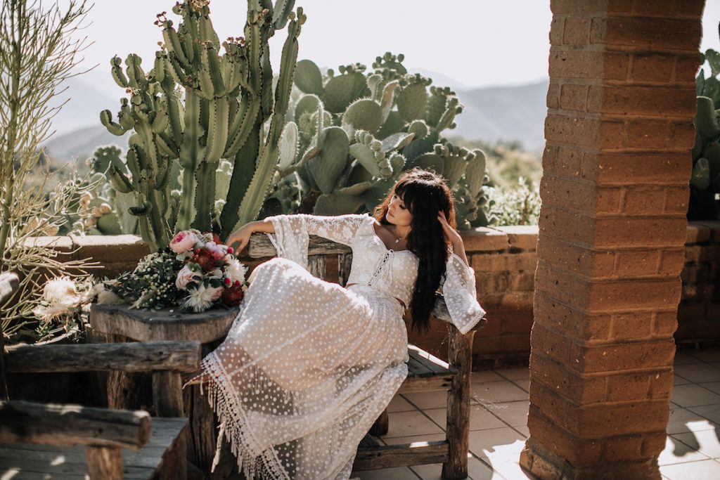 Bride-Amanda-wearing-bohemian-two-piece-wedding-dress-at-Condor's-Nest-Ranch