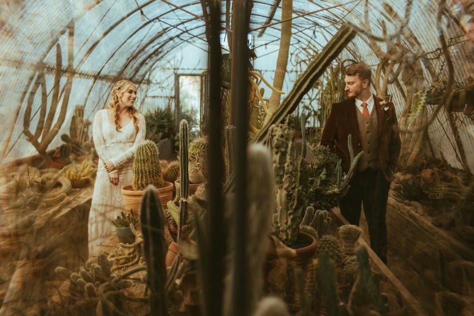 the-boho-couple-poised-in-cactus-garden