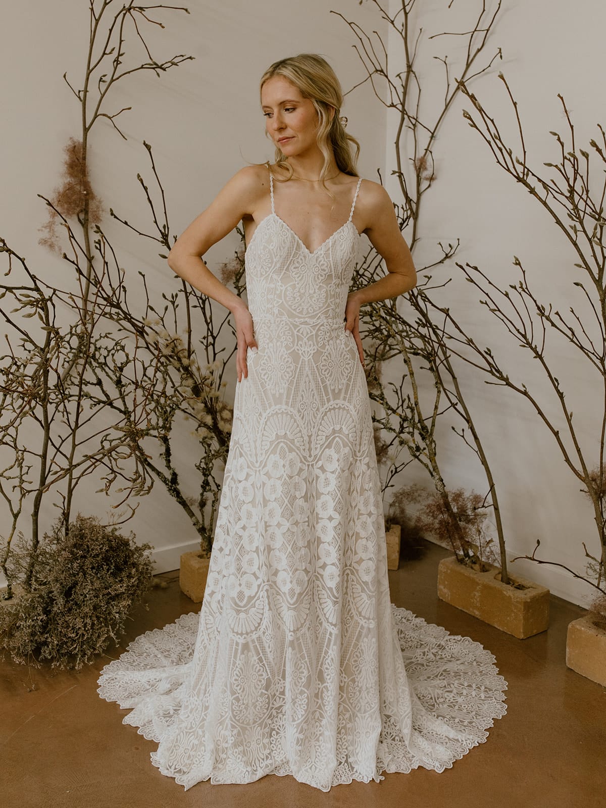 Carissa-Lace-wedding-dress-witth-bell-sleeves-and-fringe-tassel-hem