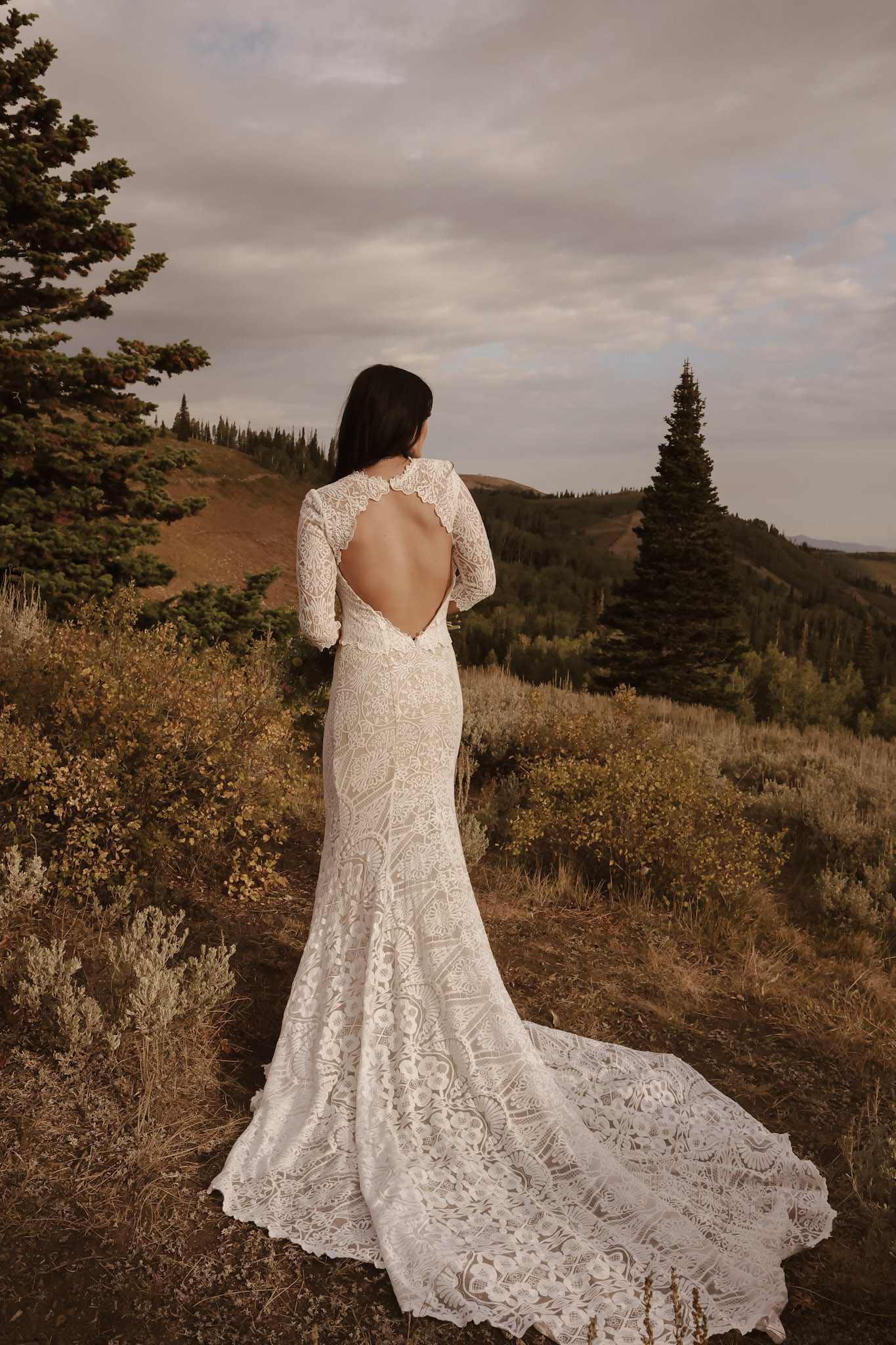 Back-view-of-bride-in-keyhole-back-lace-wedding-dress-Kate-gown