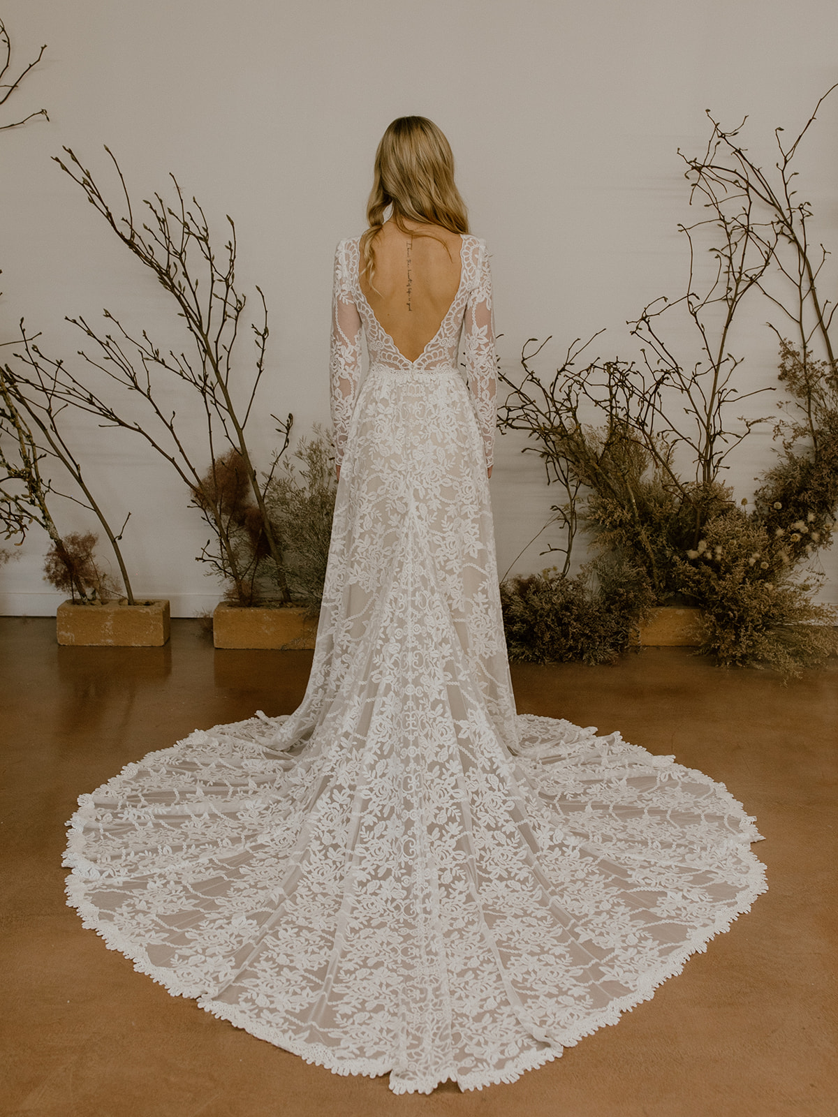 Dahlia-lace-elegant-flowy-wedding-dress-for-the-bride-looking-for-a-classic-romantic-silhouette