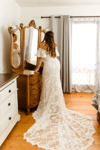 Bride-Emily-getting-ready-for-her-first-look-at-her-ranch-wedding