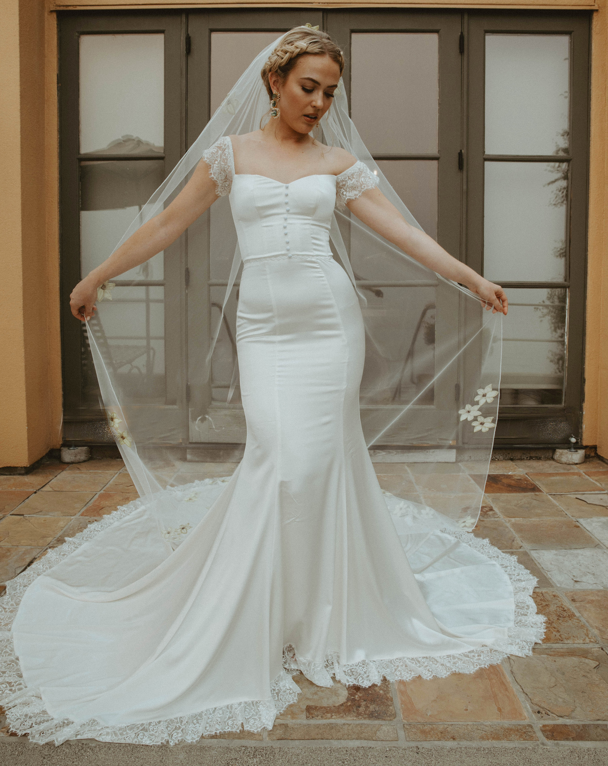 https://www.dreamersandlovers.com/wp-content/uploads/2023/04/Scarlett-Silk-Wedding-Dress-with-Off-Shoulder-design.jpg