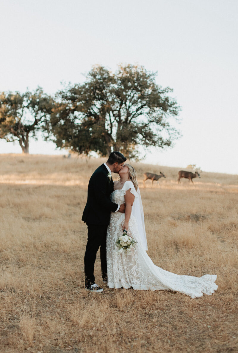 bride-wearing-Kelly-whimsical-wedding-dress-in-lace