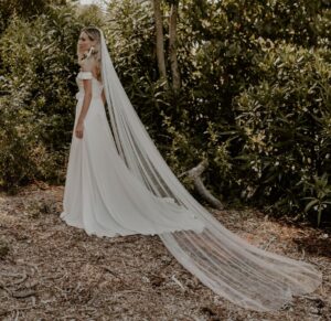 Clementine-silk-wedding-dress-shown-with-Veil