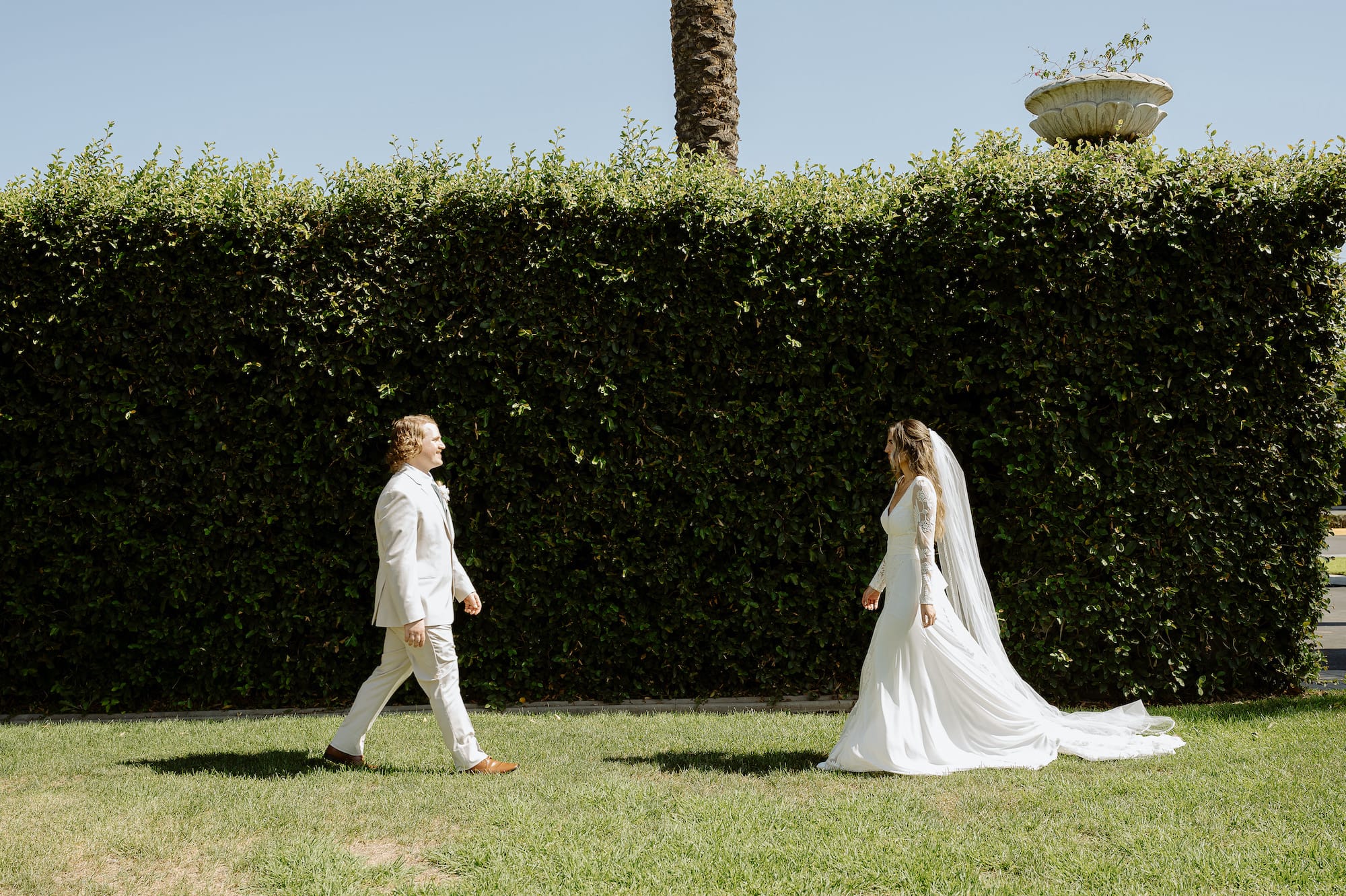 bride-Andrea-walking-to-her-first-look