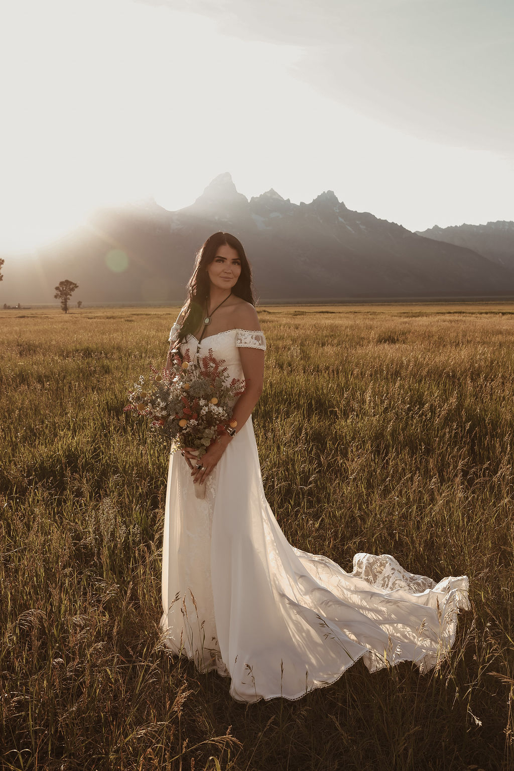 The Christiana lace and crepe off-shoulder wedding dress
