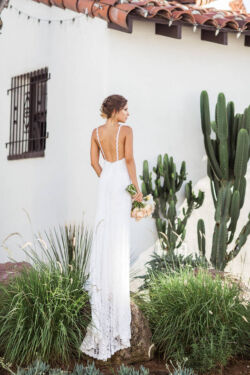 Alexis wearing Amber<br/>By Ostara Photography bohemian-bride-wearing-backless-amber-lace-dress-at-casino-san-clemente