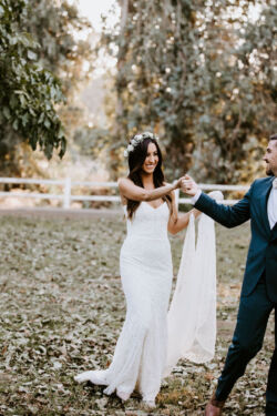Bride Casie wearing Jenny Dress | Photo: @geoffandlyndsi bride-casie-wearing-Jenny-boho-strapless-romantic-lace-dress