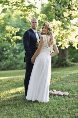 Bride Ashley wearing Amy + Fiona in white bride-wearing-amy-2-piece-silk-and-lace-boho-wedding-dress-shown-in-white
