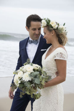 Bride Sara in Alexandria Dress<br/>Color shown: Ivory with Ivory Liner bride-sara-wearing-alexandria-dress-in-ivory-lace-and-flower-crown