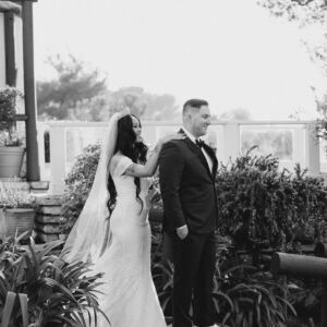 Real Bride wearing an off the shoulder wedding dress in the most beautiful lace