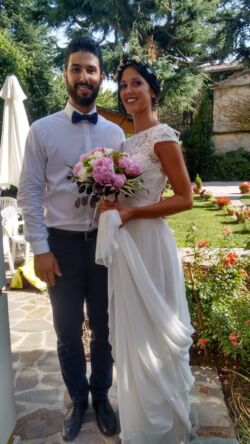 Bride Alessandra in Natalie in Off-White Dress<br/> bohemian-chic-brie-wearing-silk-and-lace-wedding-dress-with-front-slit-in-her-Italian-wedding