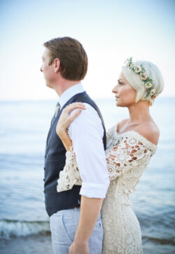 Bride Heidi in Holly Dress<br/> bride-wearing-holly-crochet-lace-wedding-dress-with-bell-sleeves-on-beach