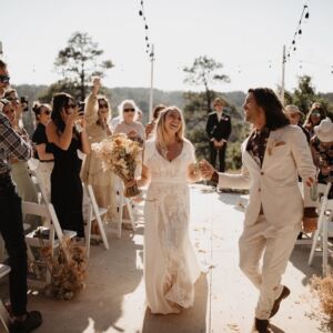 Real California bride wearing the flowy lace and crepe boho wedding dress | Bohemian Bridal Inspo