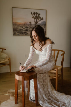 Christiane wearing Meredith | @sarahlindaphotography bride-Christiane-joshua-tree-elopement-wearing-fringe-wedding-dress