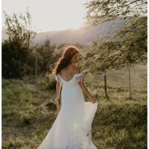 Real Bride in South Africa wearing an off the shoulder wedding dress with fringe | Bohemian Bridal
