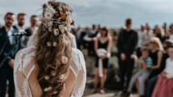 Bride Amanda wearing Violetta| David Jesse Photo bride-with-flowers-in-her-hair-bohemian-wedding-in-New-Mexico